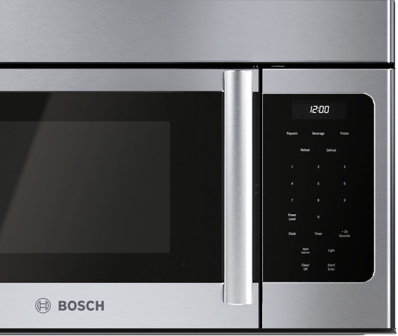 Four à micro-ondes à hotte intégrée Bosch de série 300 de 1,6 po et de 300 pi3/min - HMV3054C