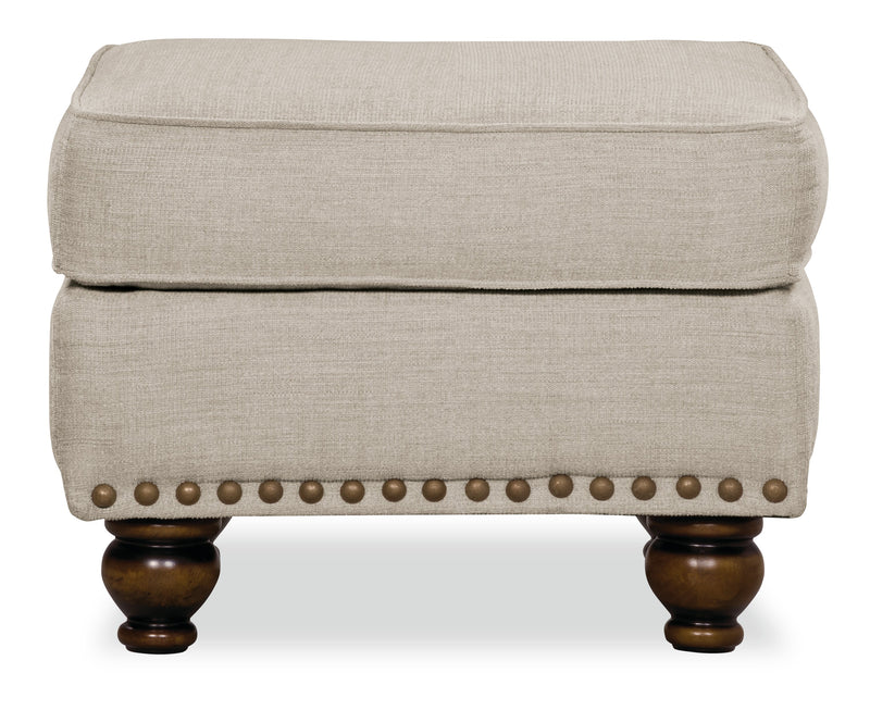 Pouf Wynn de 24 po fabriqué au Canada en tissu de chenille avec bordure de clous décoratifs et pattes en oignon en bois - lin