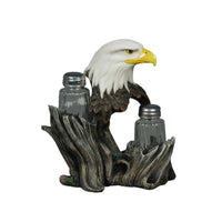 Salière et poivrière avec tête d’aigle