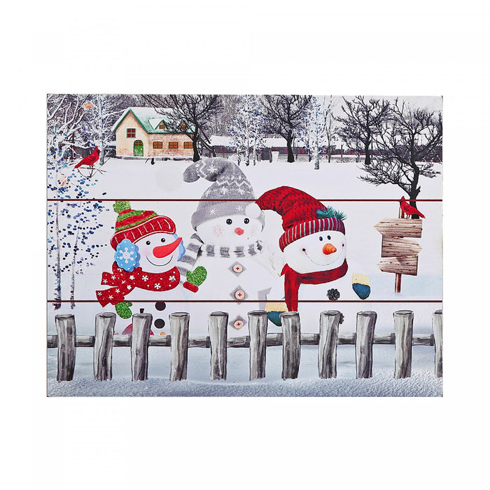 Décoration murale de type plaque en bois avec trois bonshommes de neige