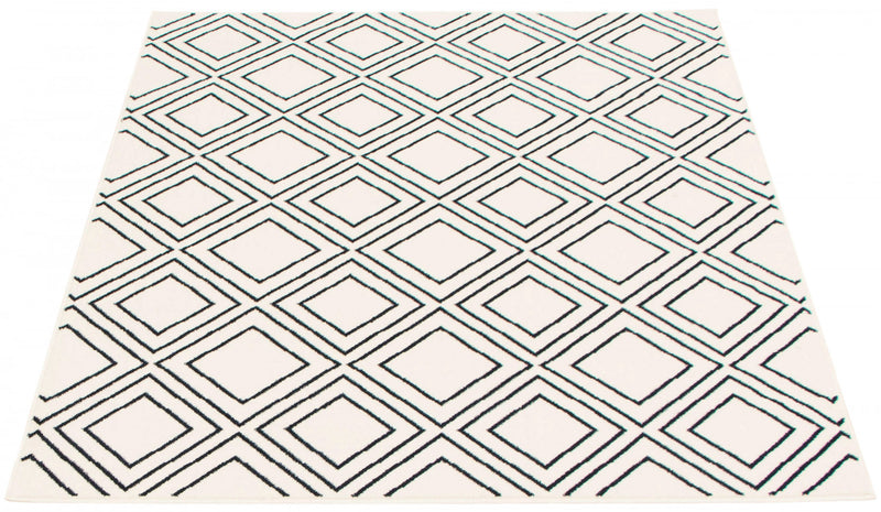 Carpette August blanc géodebleu marine 6 pi 7 po x 9 pi 6 po