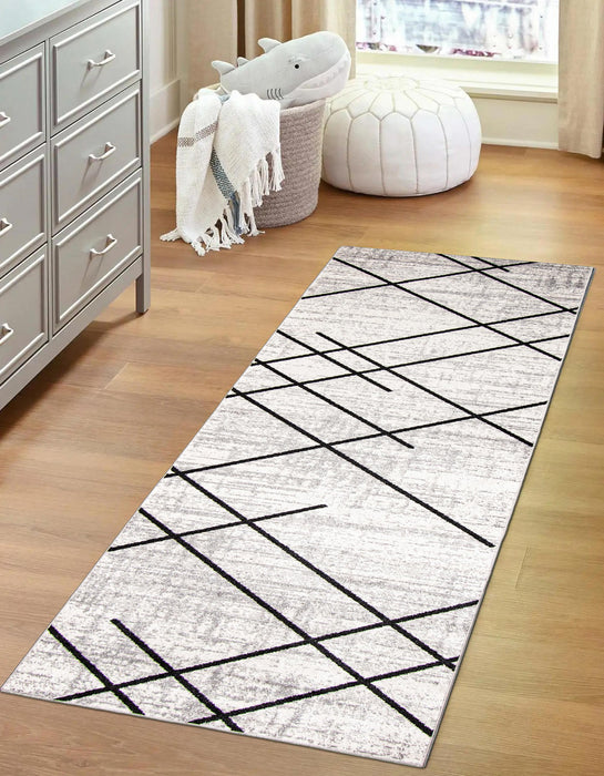 Carpette Damali ivoire et noire lavable à la machine - 2 pi 6 po x 8 pi 0 po