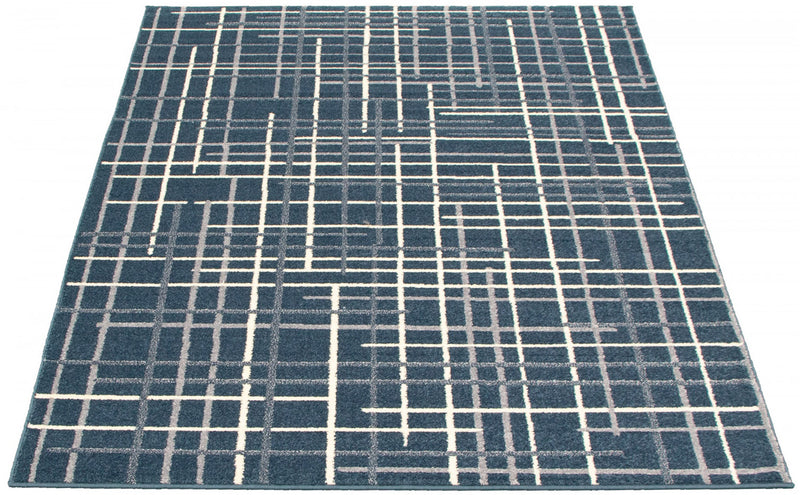Carpette Taite couleur pétrole - 3 pi 11 pox 5 pi 7 po