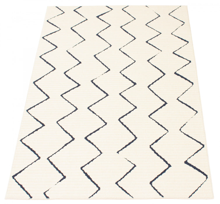 Carpette Kimi bleueivoire 6 pi 7 po x 9 pi 6 po