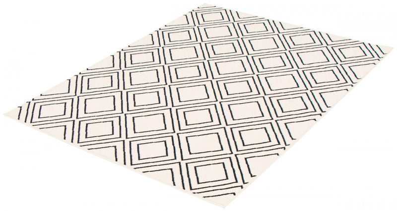 Carpette August blanc géodebleu marine 5 pi 3 po x 7 pi 3 po