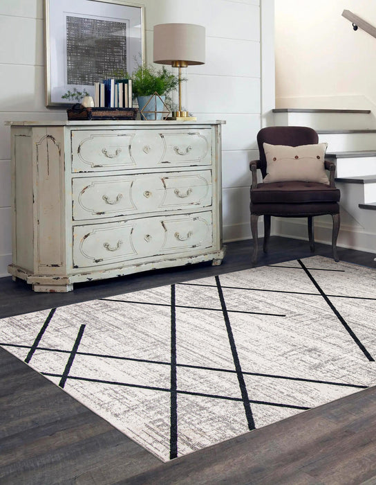 Carpette Damali ivoire et bleue lavable à la machine - 3 pi 0 po x 5 pi 0 po