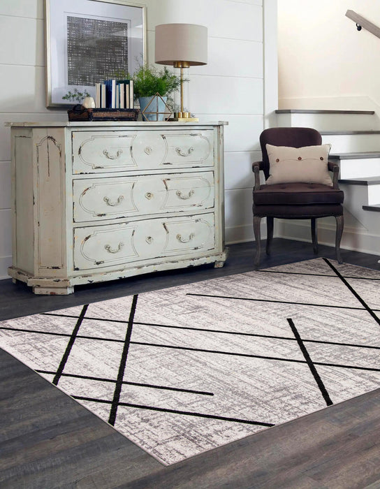 Carpette Damali ivoire et noire lavable à la machine - 5 pi 0 po x 7 pi 0 po