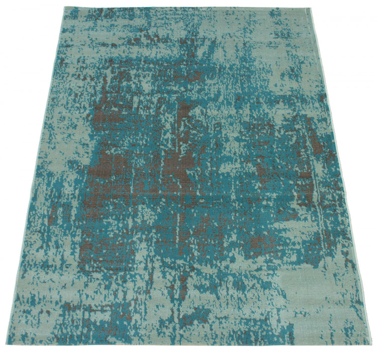 Carpette Mariam turquoise 4 pi 7 po x 6 pi 7 po