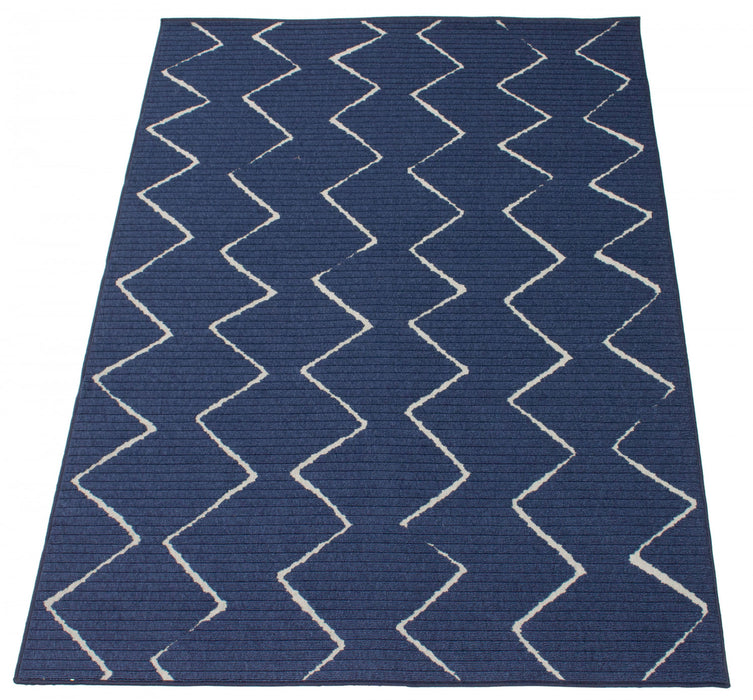 Carpette Kimi bleue 5 pi 3 po x 7 pi 7 po