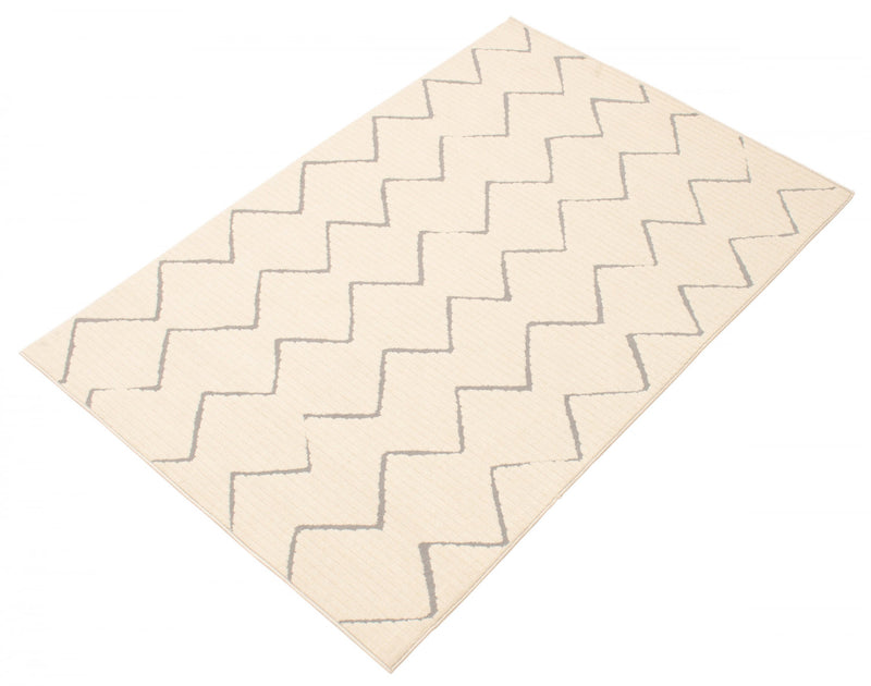 Carpette Kimi ivoire 5 pi 3 po x 7 pi 7 po