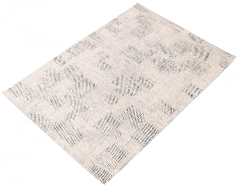 Carpette Piedad grise 6 pi 7 po x 9 pi 6 po