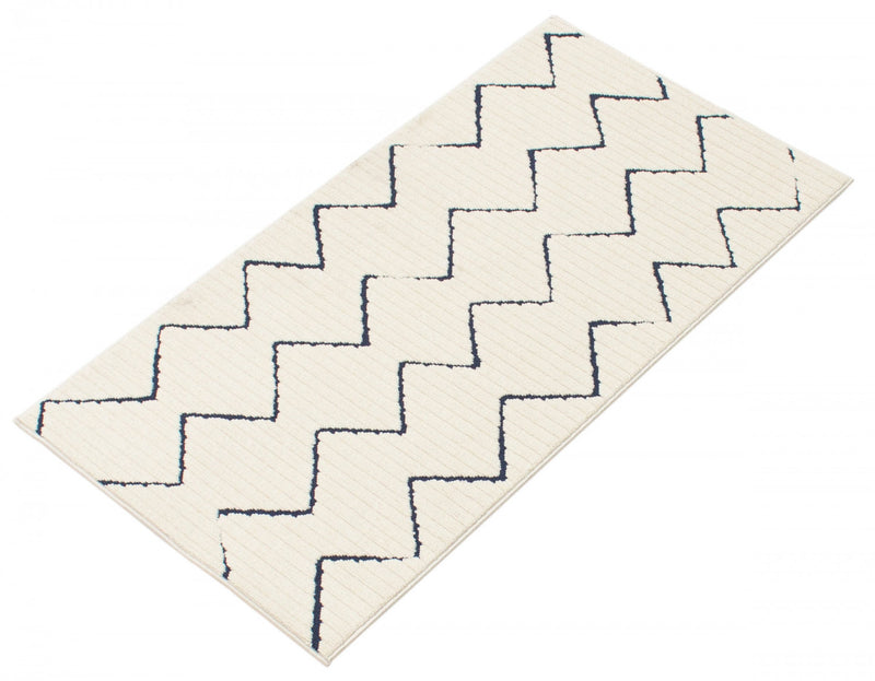 Carpette Kimi bleueivoire 2 pi 8 po x 4 pi 11 po