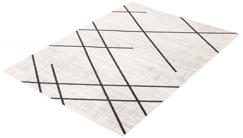 Carpette Damali ivoire et bleue lavable à la machine - 3 pi 0 po x 5 pi 0 po