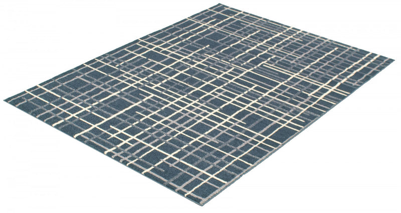 Carpette Taite couleur pétrole - 7 pi 10 pox 10 pi 2 po