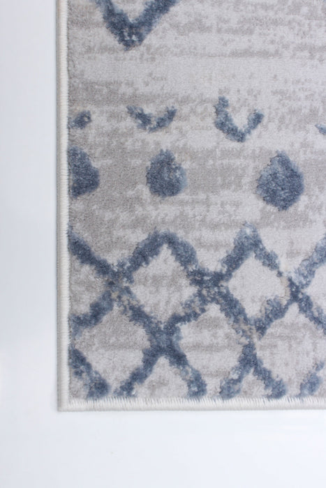 Carpette Dita bleue - 6 pi 7 po x 9 pi 6 po