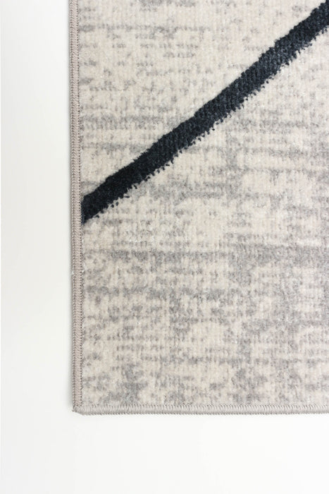 Carpette Damali ivoire et bleue lavable à la machine - 2 pi 6 po x 8 pi 0 po