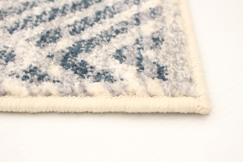 Carpette Electra argent-couleur pétrole - 5 pi 3 pox 7 pi 3 po
