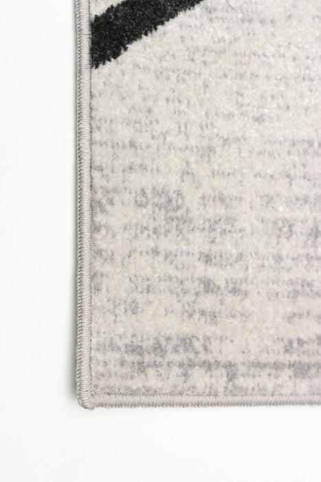 Carpette Damali ivoire et noire lavable à la machine - 8 pi 0 po x 10 pi 0 po