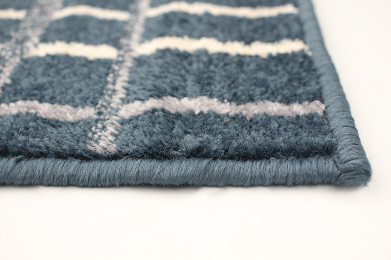 Carpette Taite couleur pétrole - 3 pi 11 pox 5 pi 7 po