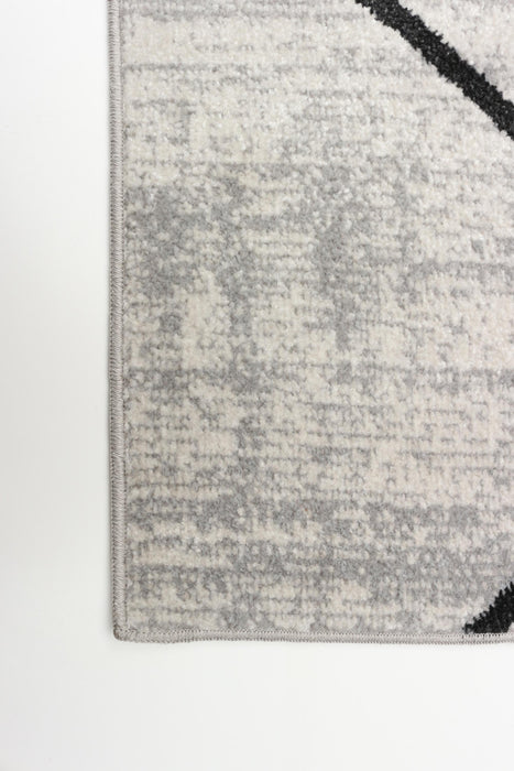 Carpette Damali ivoire et noire lavable à la machine - 2 pi 6 po x 8 pi 0 po