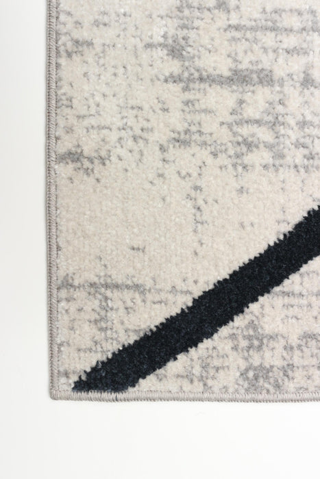 Carpette Damali ivoire et bleue lavable à la machine - 6 pi 0 po x 9 pi 0 po