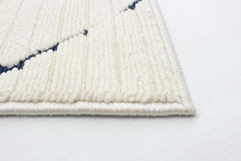 Carpette Kimi bleueivoire 2 pi 8 po x 4 pi 11 po