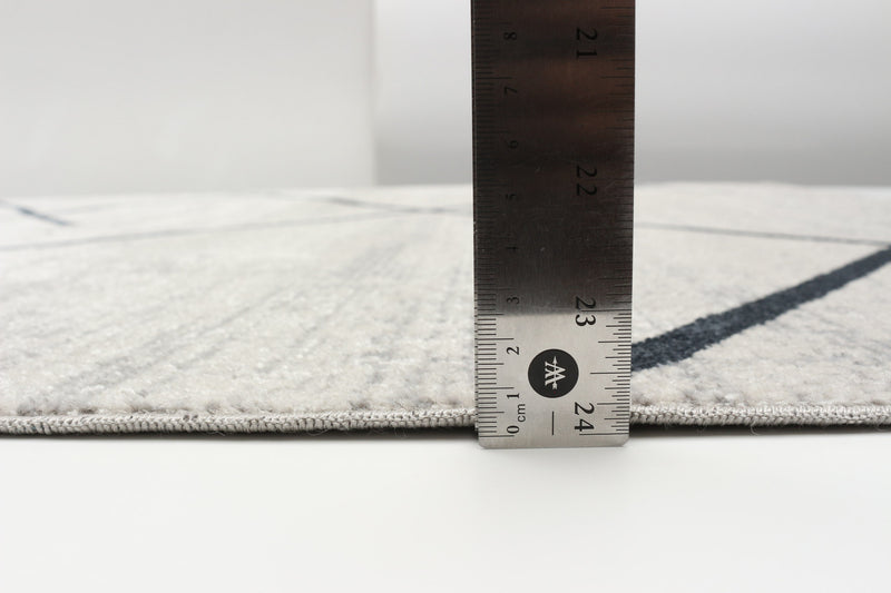 Carpette Damali ivoire et bleue lavable à la machine - 3 pi 0 po x 5 pi 0 po