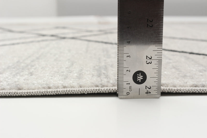 Carpette Damali ivoire et noire lavable à la machine - 2 pi 6 po x 8 pi 0 po