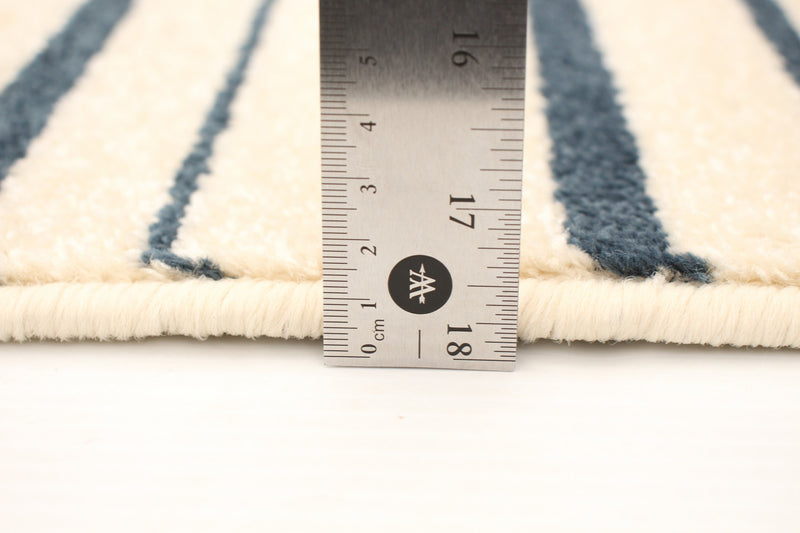 Carpette Faith crème-couleur pétrole - 3 pi 11 pox 5 pi 7 po