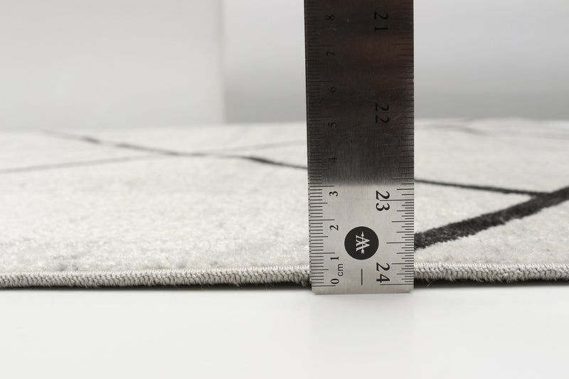 Carpette Damali ivoire et noire lavable à la machine - 6 pi 0 po x 9 pi 0 po