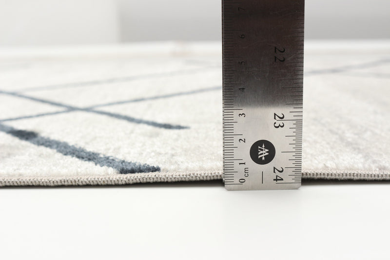 Carpette Damali ivoire et bleue lavable à la machine - 2 pi 6 po x 8 pi 0 po