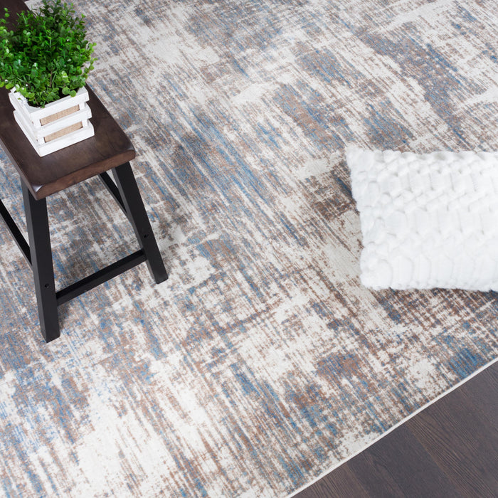 Carpette Shi bleue à motifs abstraits 5 x 8