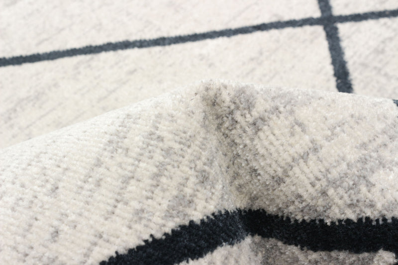 Carpette Damali ivoire et bleue lavable à la machine - 2 pi 6 po x 8 pi 0 po