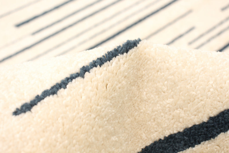 Carpette Faith crème-couleur pétrole - 3 pi 11 pox 5 pi 7 po