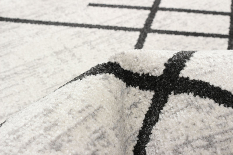 Carpette Damali ivoire et noire lavable à la machine - 2 pi 6 po x 8 pi 0 po