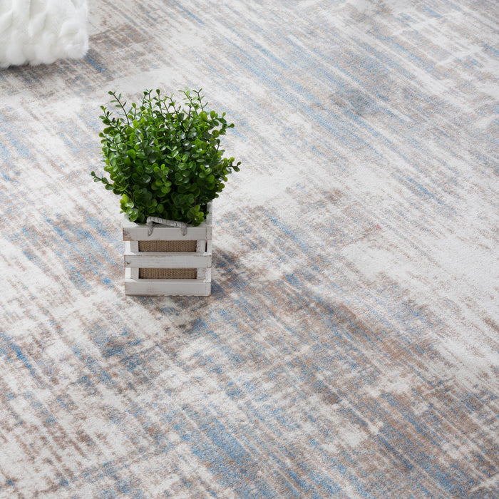 Carpette Shi bleue à motifs abstraits 5 x 8