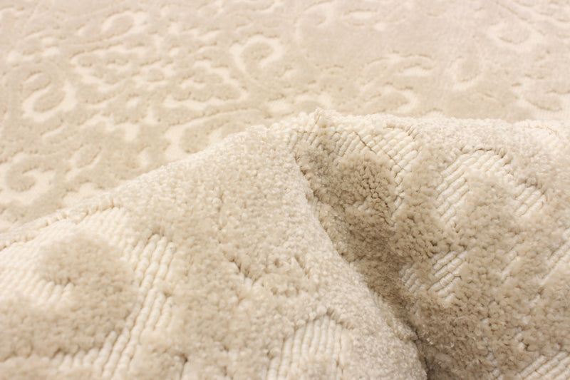 Carpette Caledonia ivoire 5 pi 3 po x 7 pi 7 po