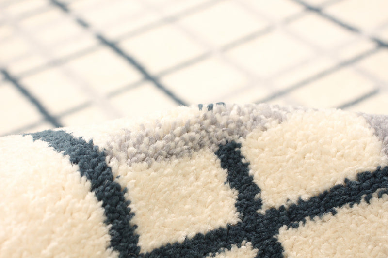 Carpette Taite crème-couleur pétrole - 7 pi 10 pox 10 pi 2 po