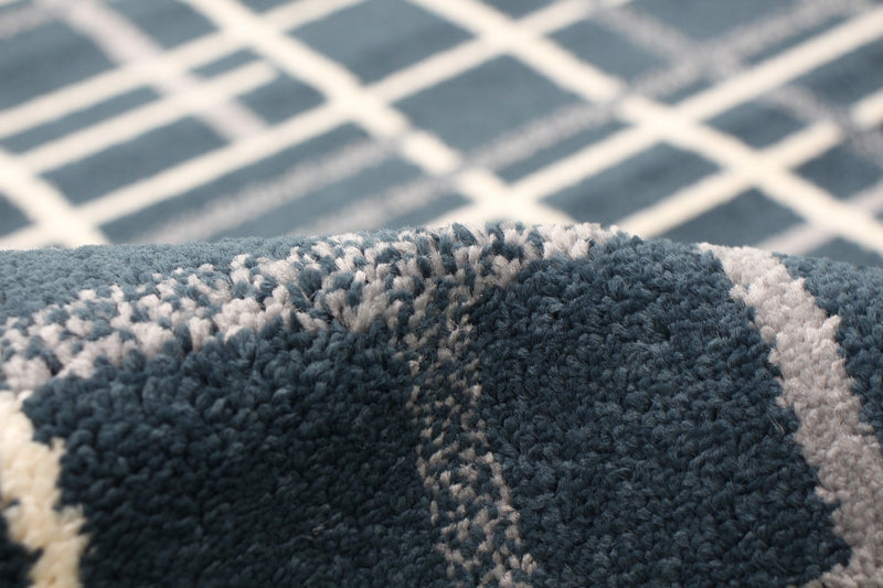 Carpette Taite couleur pétrole - 7 pi 10 pox 10 pi 2 po