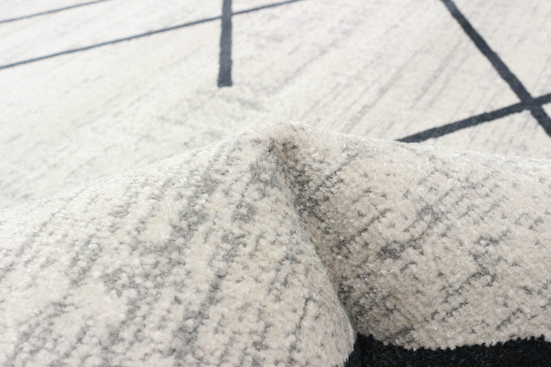 Carpette Damali ivoire et bleue lavable à la machine - 3 pi 0 po x 5 pi 0 po