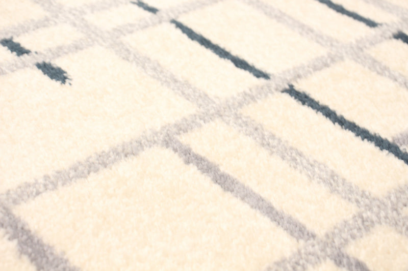 Carpette Taite crème-couleur pétrole - 7 pi 10 pox 10 pi 2 po