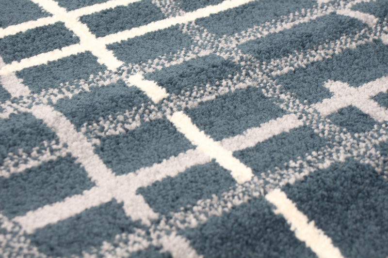 Carpette Taite couleur pétrole - 3 pi 11 pox 5 pi 7 po