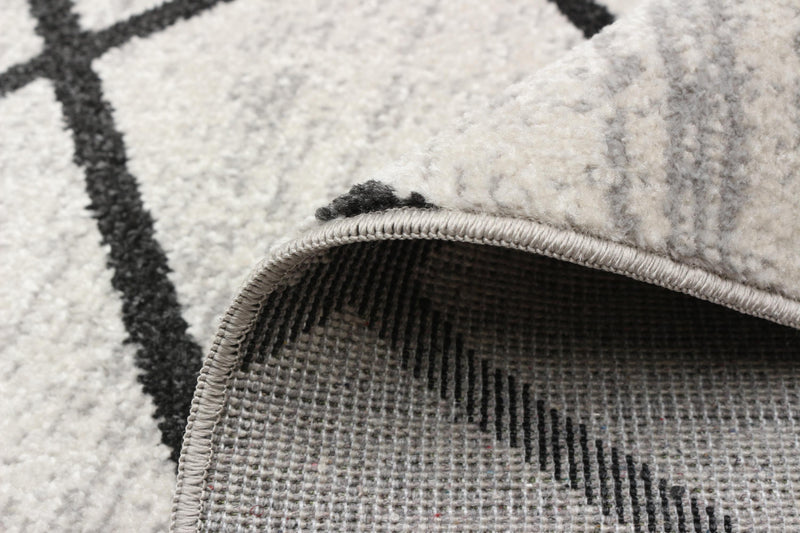 Carpette Damali ivoire et noire lavable à la machine - 2 pi 6 po x 8 pi 0 po