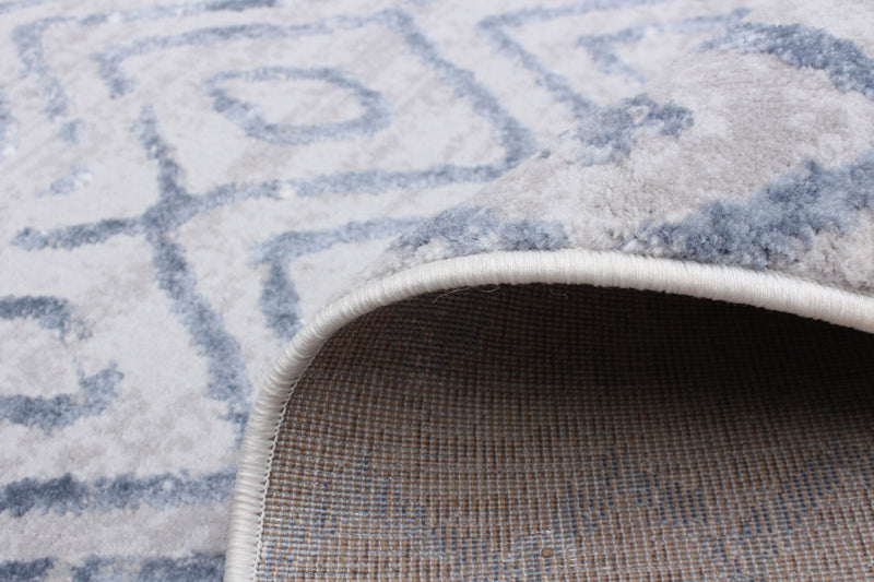 Carpette Dita bleue - 6 pi 7 po x 9 pi 6 po