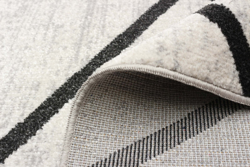 Carpette Damali ivoire et noire lavable à la machine - 6 pi 0 po x 9 pi 0 po
