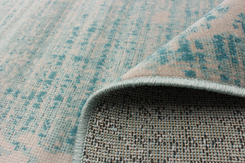 Carpette Janaki bleu sarcelle 5 pi 3 po x 7 pi 7 po