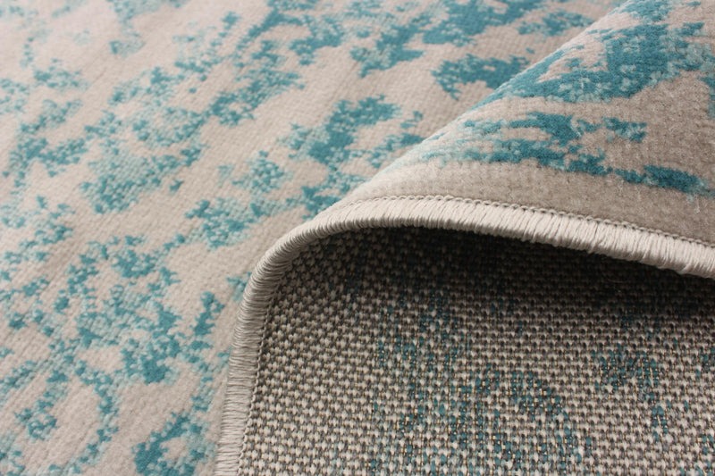Carpette Corinne turquoise 5 pi 3 po x 7 pi 7 po