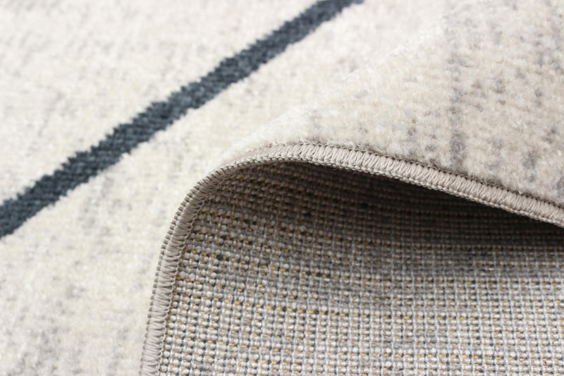 Carpette Damali ivoire et bleue lavable à la machine - 2 pi 6 po x 8 pi 0 po