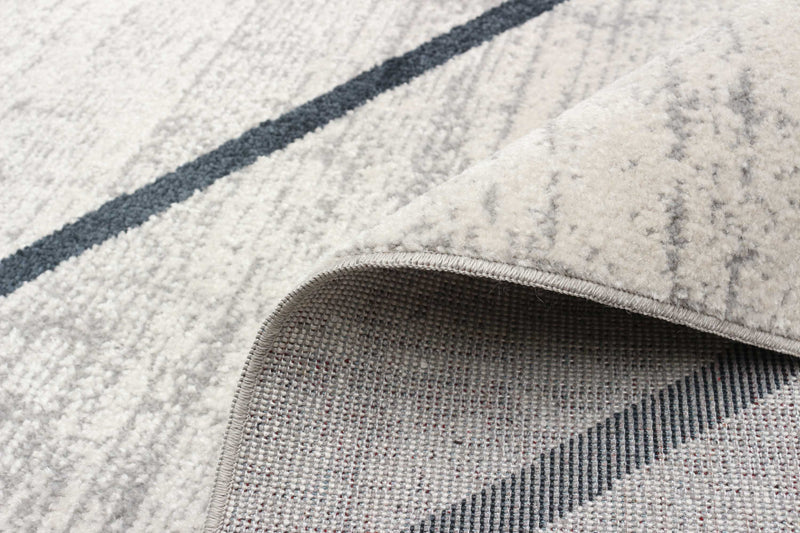 Carpette Damali ivoire et bleue lavable à la machine - 6 pi 0 po x 9 pi 0 po