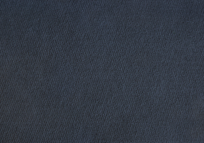 Pouf doré et tissu bleu